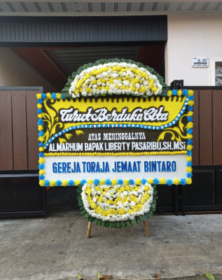 Papan Bunga Duka di Juata Permai